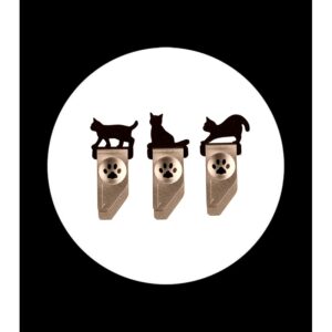 3 metal clips with cats on card